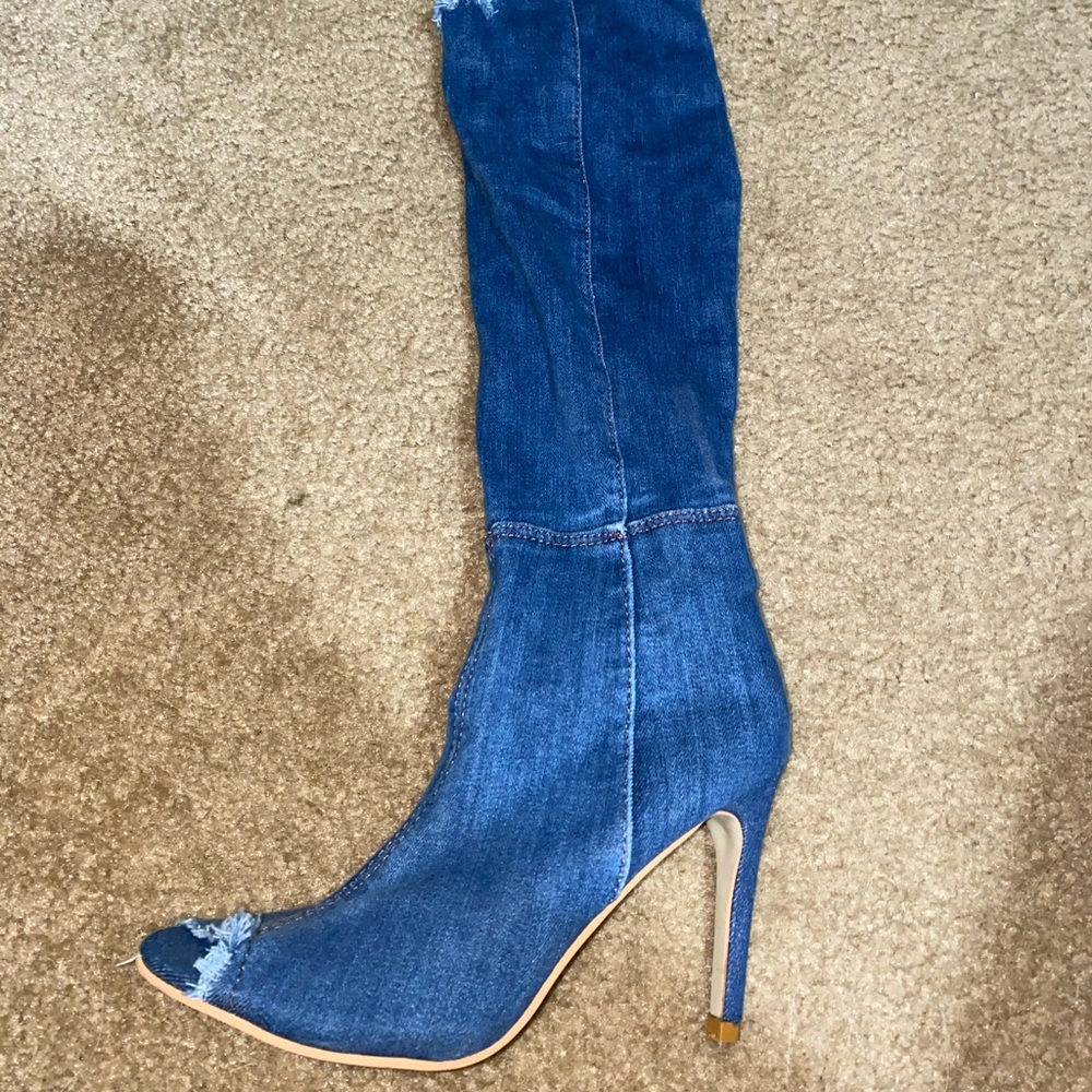 Thigh high stretchy blue jean boots